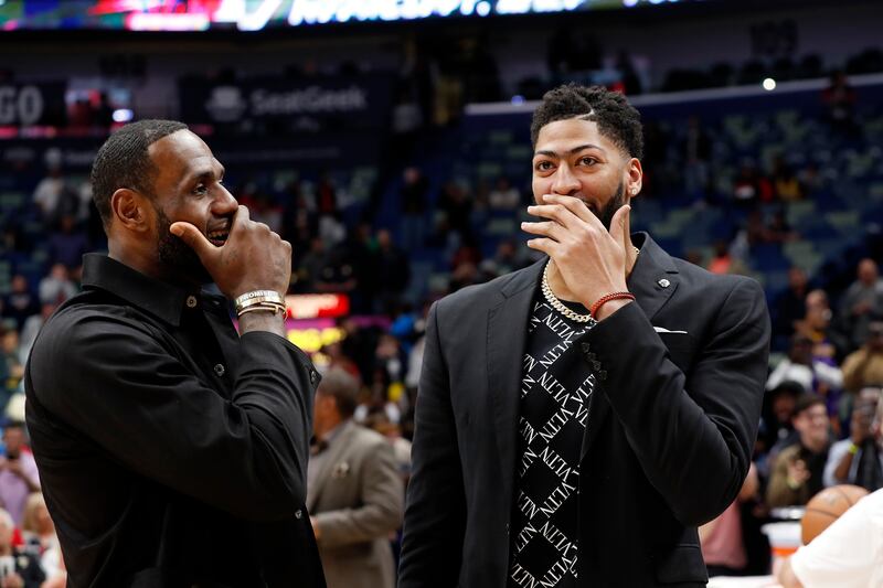 Los Angeles Lakers forward LeBron James, left, and New Orleans Pelicans forward Anthony Davis talk after a game in New Orleans, Sunday, March 31, 2019.
