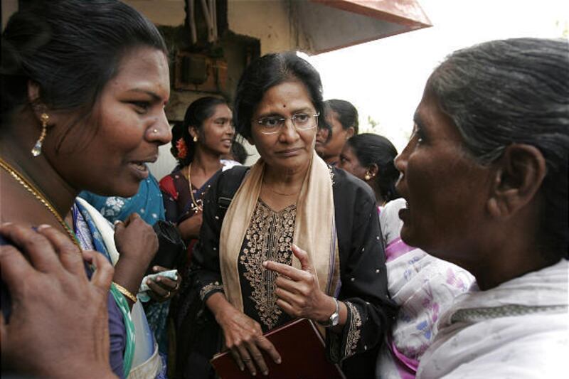 Padma Venkataraman, center, has teamed with Rising Star Outreach in India to provide micro-loans.