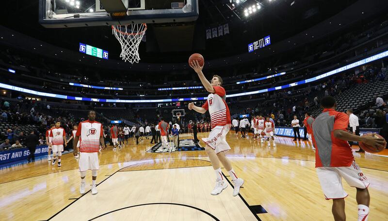 Utah Utes warm up during the NCAA basketball tournament in Denver Thursday, March 17, 2016.