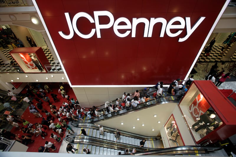 In this July 31, 2009 file photo, customers are seen in the main entrance of the new J.C. Penney store in the Manhattan Mall in New York.
