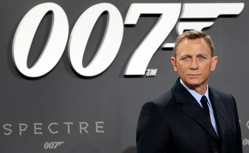 Actor Daniel Craig poses for the media as he arrives for the German premiere of the James Bond movie “Spectre” in Berlin, Germany.