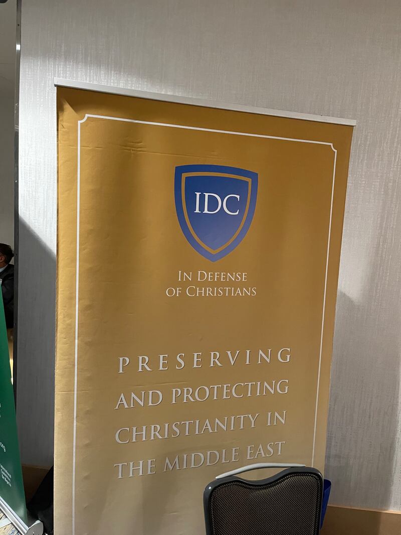 A banner for a booth at the second annual IRF Summit on global religious freedom in Washington, D.C., on June 29, 2022.