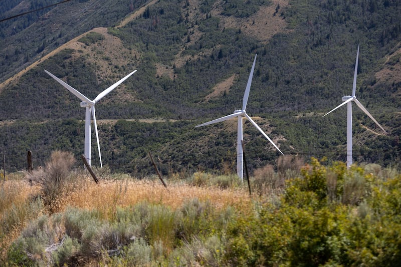 Wind turbines are seen from outside of the Spanish Fork Wind Park in Spanish Fork on uly 28, 2022.