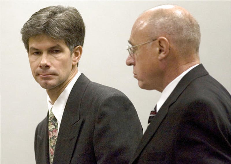 Fertility specialist Larry Andrew stands next to attorney Ken Brown during sentencing on Tuesday.
