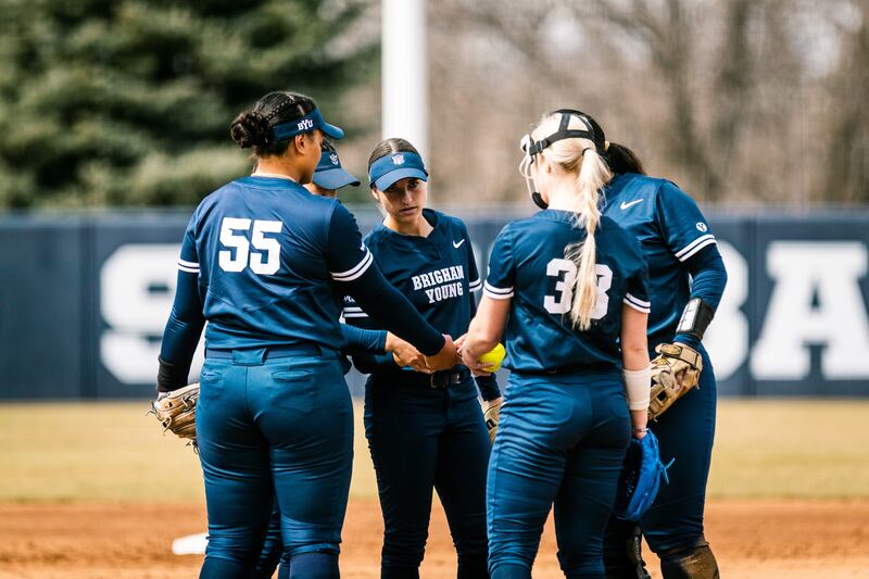BYU players huddle on the mound during game against Southern Utah on March 22, 2022.
