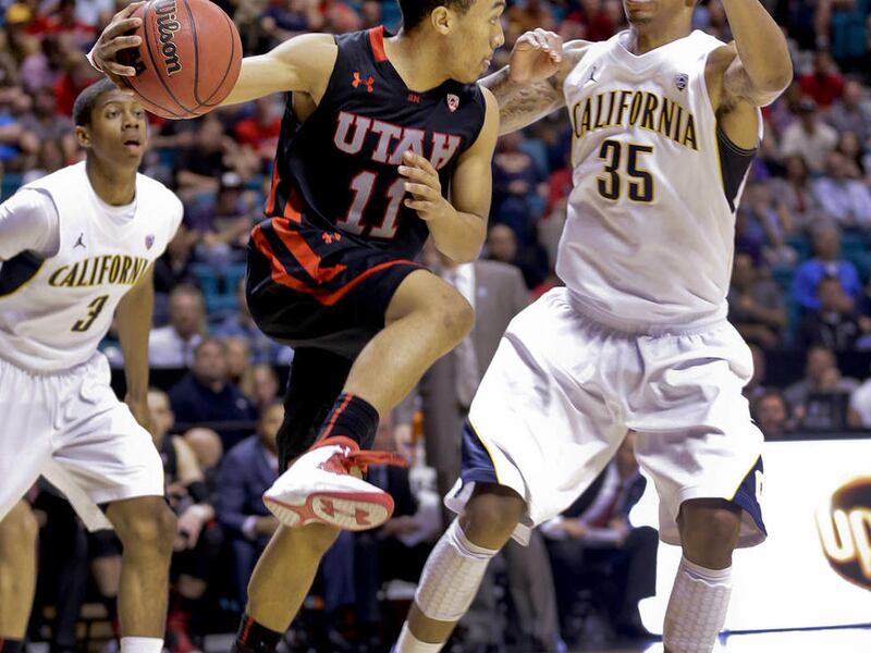 Utah's Brandon Taylor looks to pass around California's Richard Solomon during the second half of a Pac-12 men's tournament NCAA college basketball game, Thursday, March 14, 2013, in Las Vegas. Utah won in overtime, 79-69. (AP Photo/Julie Jacobson)