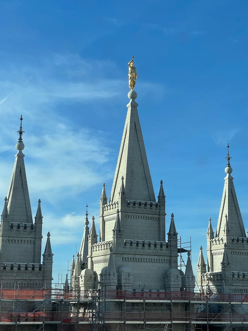 The Angel Moroni glistens in unusually warm sunshine atop the Salt Lake Temple on Wednesday, Dec. 10, 2025.