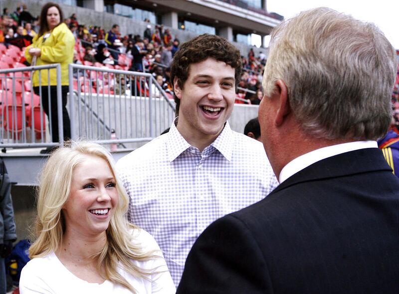 Jimmer Fredette (center) and his girlfriend, Whitney Wonnacott talk with Real Salt Lake co-owner, Dell Loy Hansen prior to their match up against the Los Angeles Galaxy at the season home opener at Rio Tinto in Salt Lake City Saturday, March 26, 2011. (B