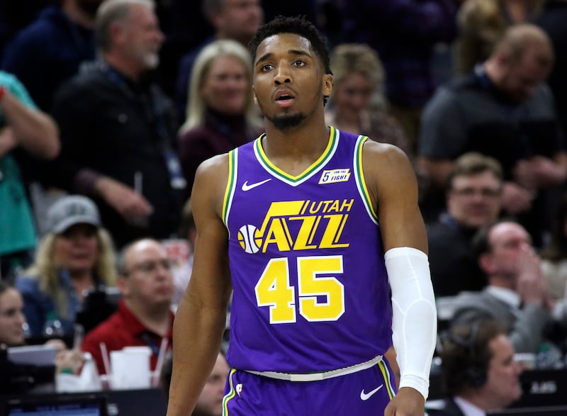 Utah Jazz guard Donovan Mitchell (45) walks on the court as the Jazz are losing to the New Orleans Pelicans in an NBA basketball game at the Vivint Smart Home Arena in Salt Lake City on Monday, March 4, 2019.