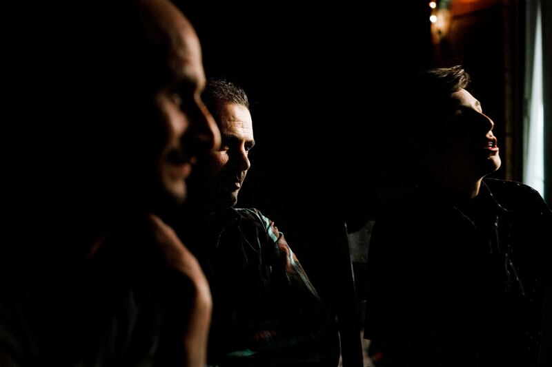 Mohammad Hredeen, Malek Hamad and Yaman Hredeen, enjoy the cool evening weather after eating iftar — breaking of the daily fast during Ramadan — June 6, 2017.