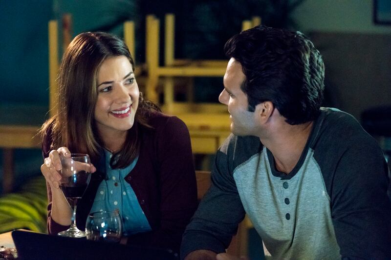 Julie Gonzalo and Eric Aragon in “Pumpkin Pie Wars.”