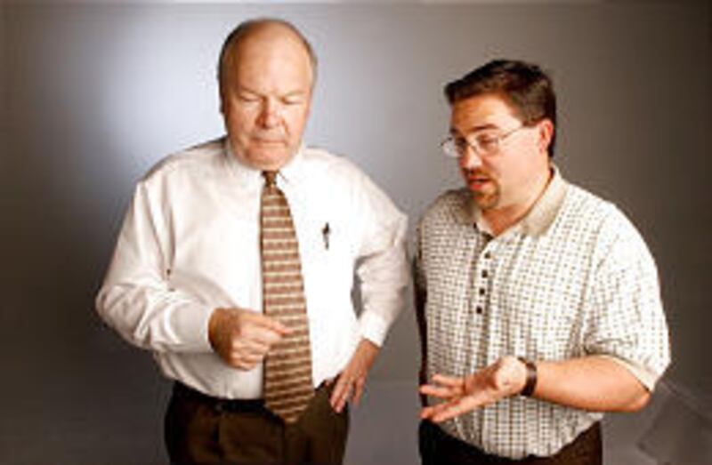 BYU professor Robert Millet, left, and Pastor Greg Johnson go to college campuses and do seminars on the similarities and differences between Mormons and evangelicals.