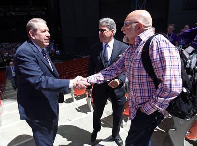 Elder Donald L. Hallstrom shakes hands with Dr. Timothy Seelig, artistic director and conductor of the San Francisco Gay Men's Chorus, during soundcheck at the Shoreline Amphitheatre in Mountain View, Calif., on Monday, June 25, 2018. Seelig is the guest