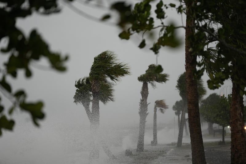 Waves crash on the shoreline along the Jensen Beach Causeway in Jensen Beach, Fla.