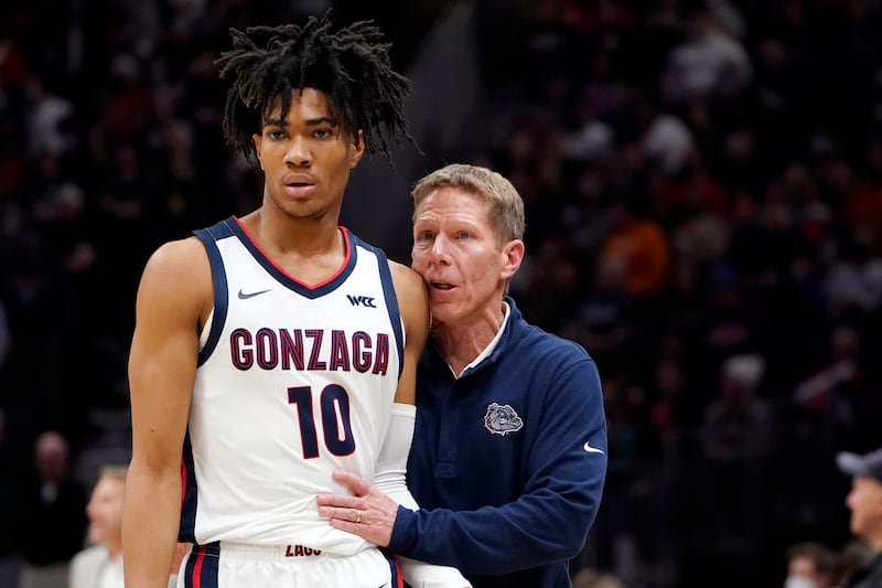 Gonzaga coach Mark Few talks with Hunter Sallis during game against Alabama on Saturday, Dec. 4, 2021, in Seattle.