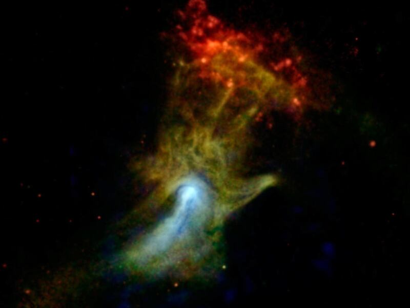 This undated x-ray image from NASA's Nuclear Spectroscopic Telescope Array, or NuSTAR, shows a cloud of material resembling a hand that was ejected from a start that exploded. High-energy X-rays are shown in blue, lower-energy X-ray light, previously dete