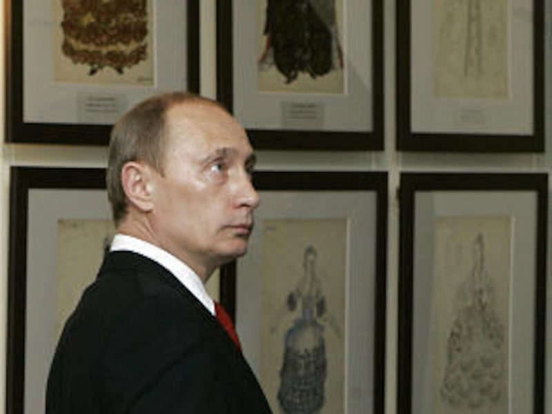 Russia's Prime Minister Vladimir Putin views an art collection on Monday in the Konstantinovsky Palace. Putin announced 24 Cabinet members, bringing in loyalists from the Kremlin.