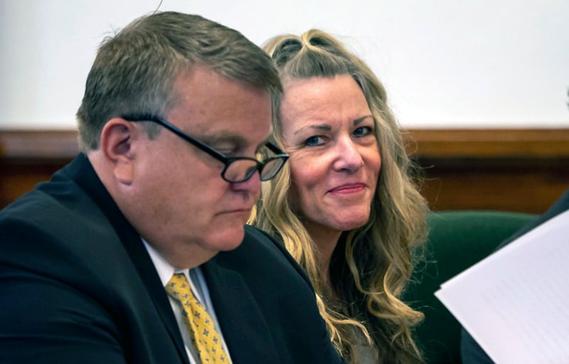 Lori Vallow Daybell, right, sits by an attorney for a hearing.
