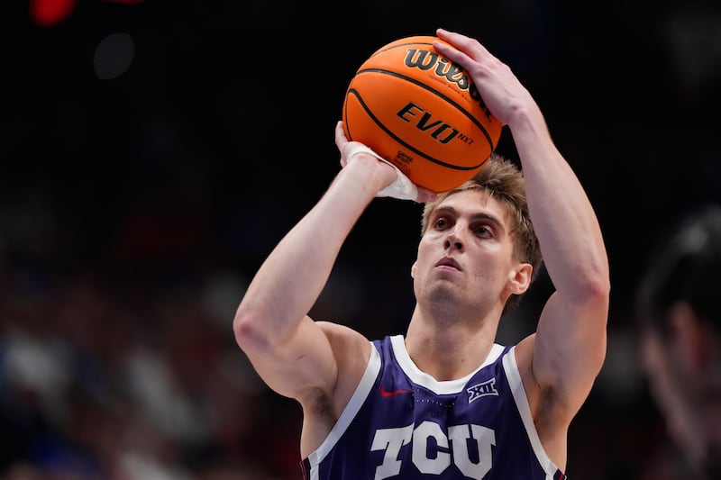TCU guard Tanner Toolson shoots during game against Kansas, Tuesday, Jan. 6, 2026, in Lawrence, Kan.