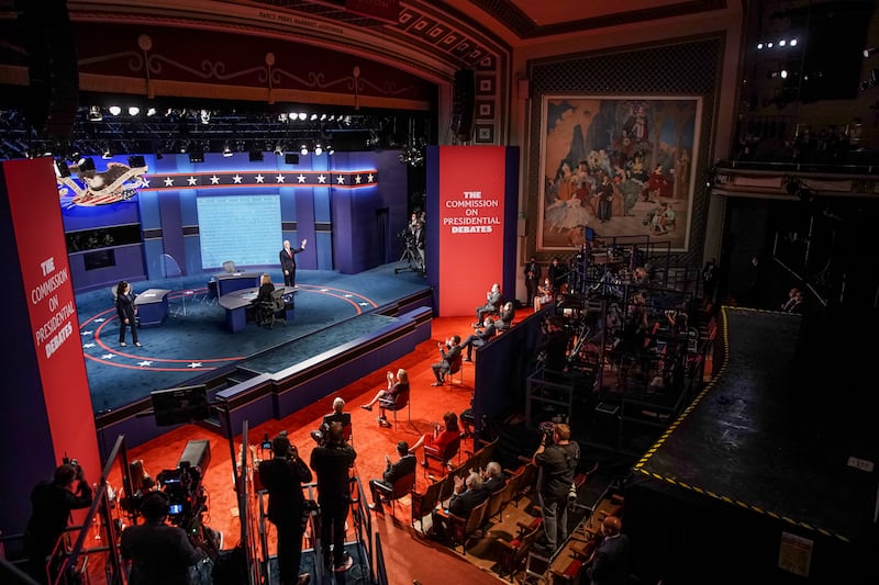 Democratic Sen. Kamala Harris and Vice President Mike Pence take the stage for a vice presidential debate at Kingsbury Hall in Salt Lake City on Oct. 7, 2020.