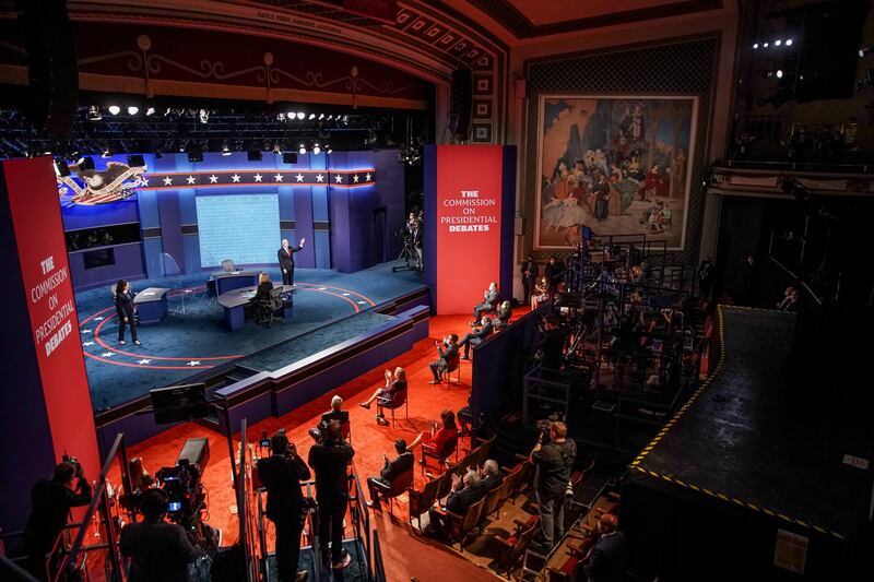 Democratic Sen. Kamala Harris and Vice President Mike Pence take the stage for a vice presidential debate at Kingsbury Hall in Salt Lake City on Oct. 7, 2020.