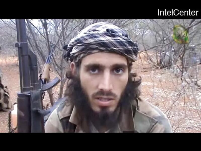 A man who gives his name as "the American" is seen on a video posted on a website of an Islamic militant group in Somalia.