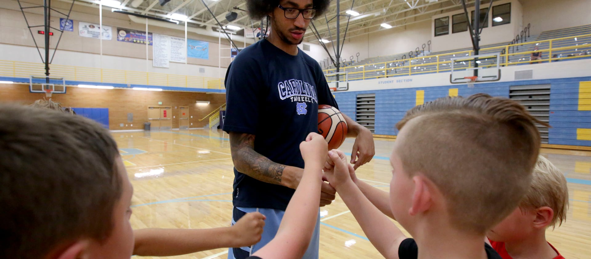 Jalen Moore coaches six boys during a Next Level Basketball training session at the Smithfield Recreation Center in Smithfield, Cache County, on Monday, Aug. 6, 2018.