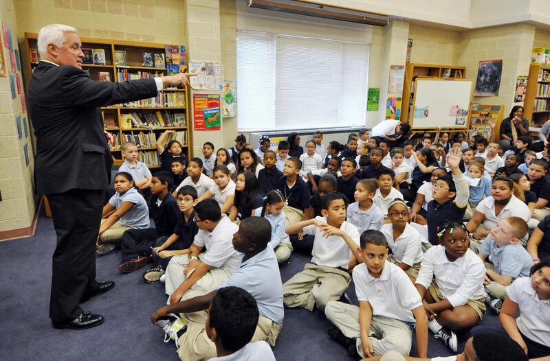 Gov. Tom Corbett calls on a student at Lincoln Charter School while answering their questions in the library before a public event in the gymnasium where he announced his education reform agenda Tuesday, Oct. 11, 2011, in York, Pa. Citing Pennsylvania's