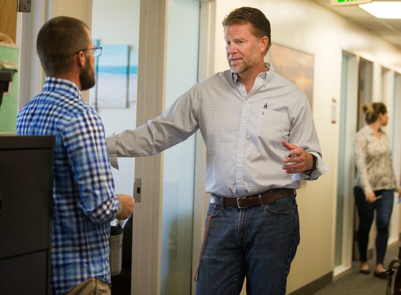 Dr. Rob Butters, Ph.D, LCSW, right, speaks with Pat Gooley, LCSW, at Lifematters Counseling and Health Center in West Valley City on Wednesday, July 18, 2018.