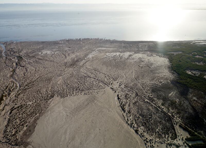 This May 1, 2015 photo shows the exposed, fried lakebed of the Salton Sea near Niland, Calif. The Golden State is now officially free of drought, according to the National Drought Mitigation Center, after experiencing some form of drought for 376 consecut