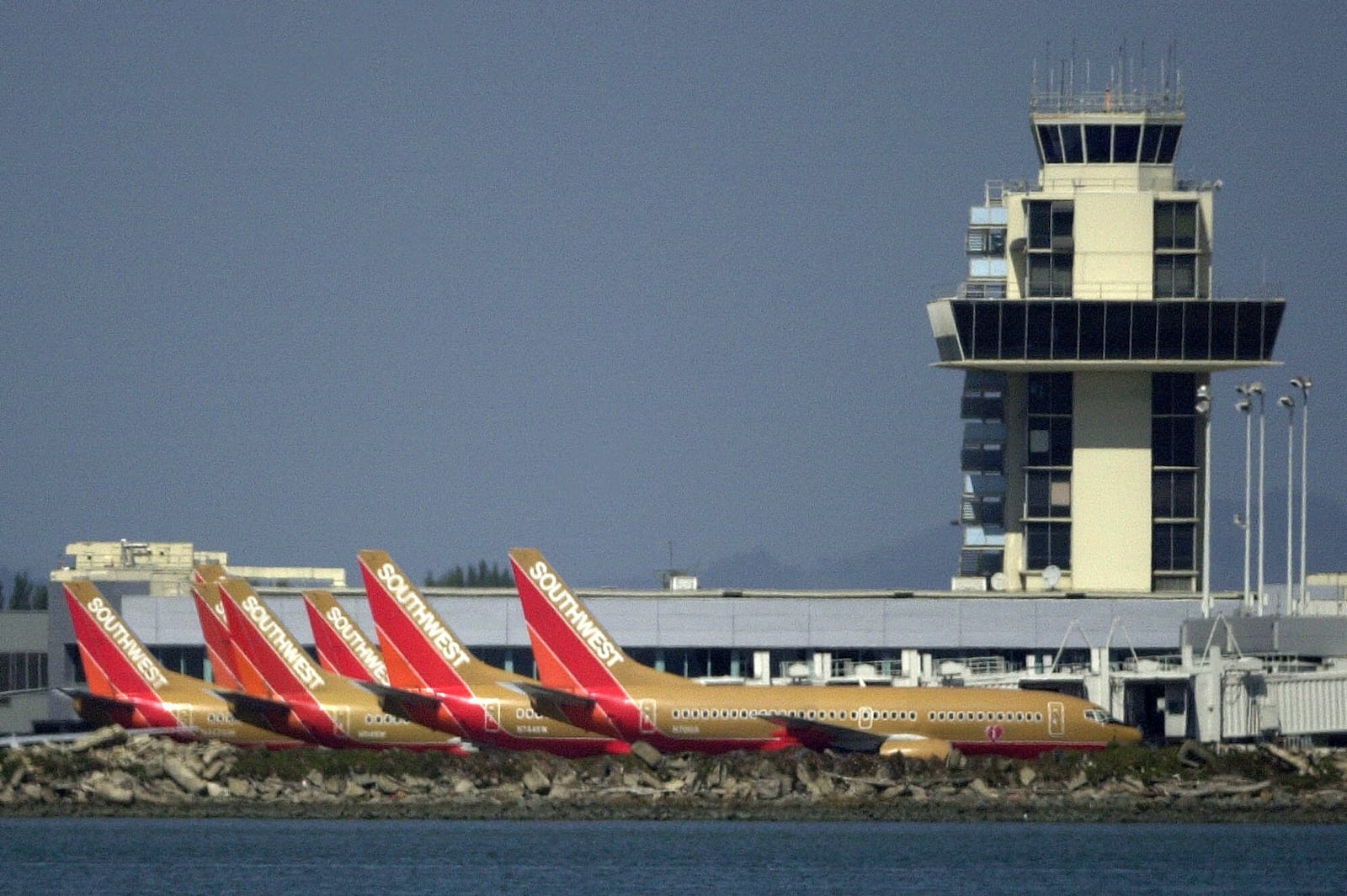 Southwest planes are seen parked beside the Oakland International Airport tower on Sept. 11, 2001, in Oakland, Calif.