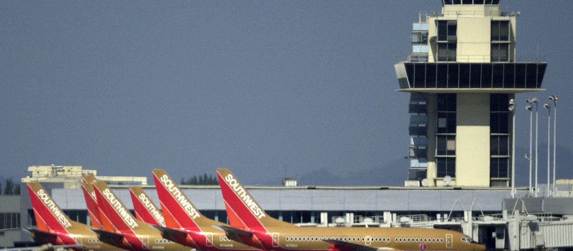 Southwest planes are seen parked beside the Oakland International Airport tower on Sept. 11, 2001, in Oakland, Calif.