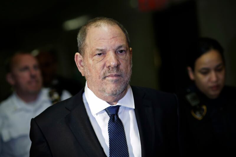 Harvey Weinstein enters State Supreme Court, Thursday, Oct. 11, 2018, in New York, where a judge was expected to issue rulings on defense motions seeking to dismiss some or all of a six-count indictment accusing Weinstein of rape and sexual assault.