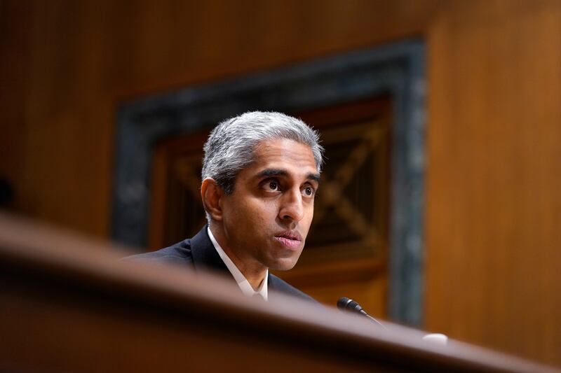 Surgeon General Dr. Vivek Murthy testifies before the Senate Finance Committee on Capitol Hill in Washington, Tuesday, Feb. 8, 2022.