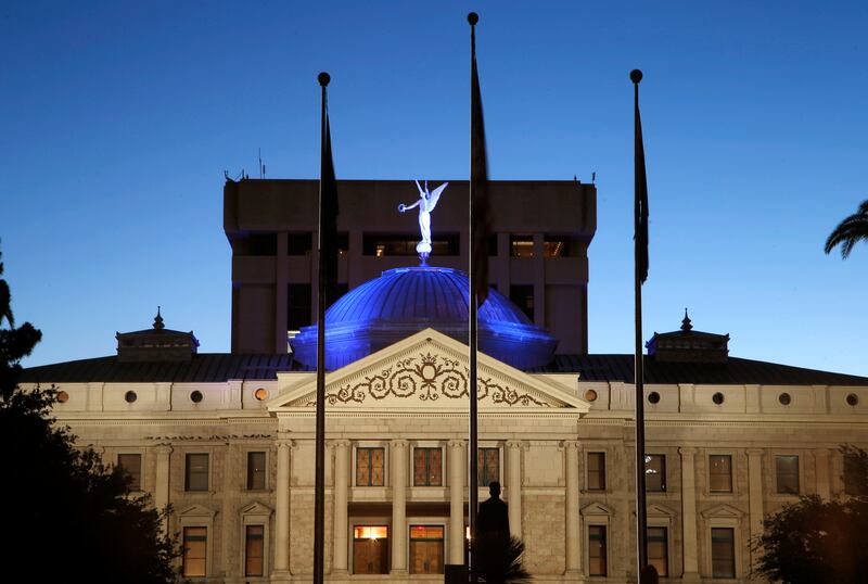 The dome of the Arizona Capitol in Phoenix is illuminated in blue in support of those battling the coronavirus in 2020.