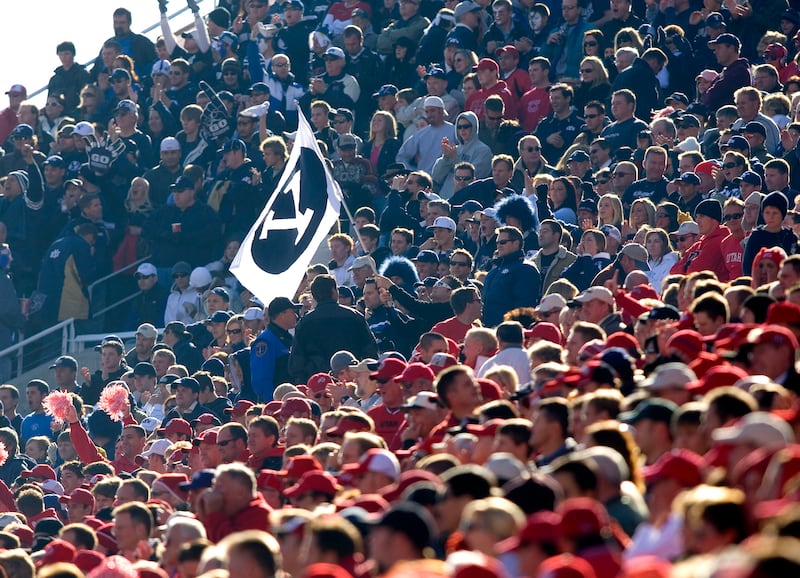A clear line can be seen between the Brigham Young University fans and the University of Utah fans during the game at Rice-Eccles Stadium in Salt Lake, Utah Saturday Nov. 25, 2006. August Miller/ Deseret Morning News