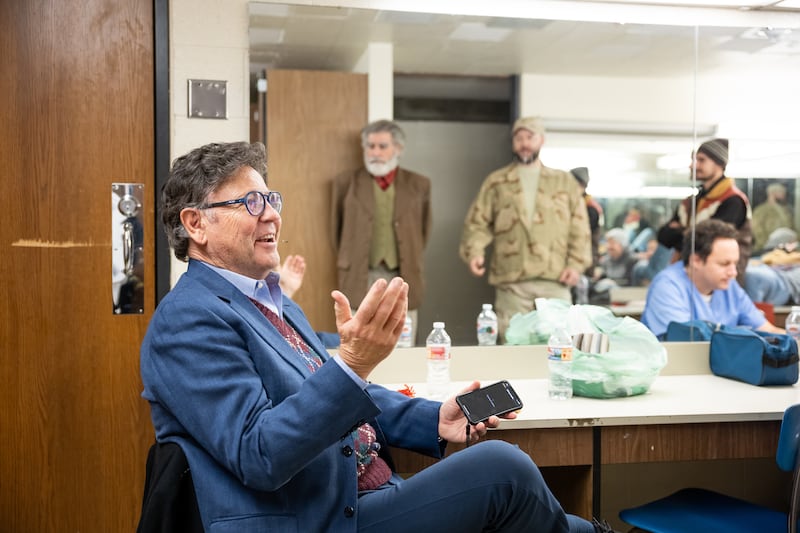 Michael McLean chats with cast members during intermission of a performance of “The Forgotten Carols.”