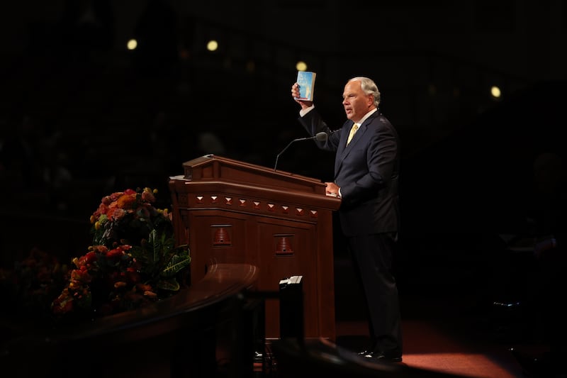 Elder Ronald A. Rasband shows his well-worn, well-read and heavily marked copy of the 1970 edition of the Book of Mormon.
