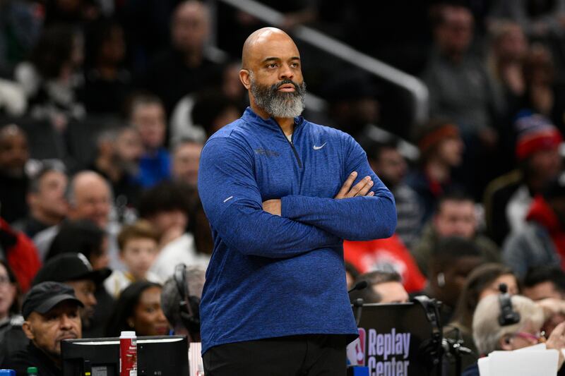 Former Washington Wizards head coach Wes Unseld Jr. looks on.