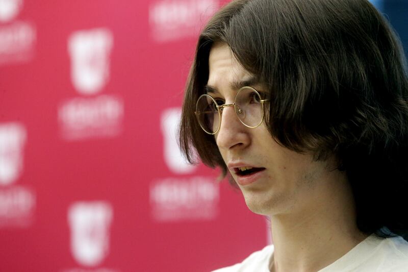 Alexander Mitchell, who was recently treated at the University of Utah Hospital for lipoid pneumonia linked to vaping, discusses his health during a press conference at the hospital in Salt Lake City on Tuesday, Aug. 6, 2019.