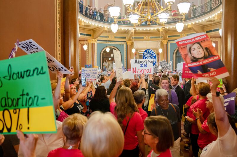 Protestors fill the Iowa State Capitol rotunda, as the Iowa Legislature convenes for a special session to pass a 6-week ‘fetal heartbeat’ abortion ban.