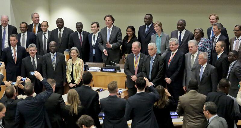 Foreign Ministers and U.N. Ambassadors representing countries that endorsed the "Kigali Principles," a pledge that troops in U.N. missions will take military action to defend civilians, pose for pictures after a meeting, Wednesday, May 11, 2016, at U.N. h