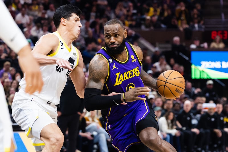 Los Angeles Lakers forward LeBron James drives the ball against Utah Jazz forward Simone Fontecchio.