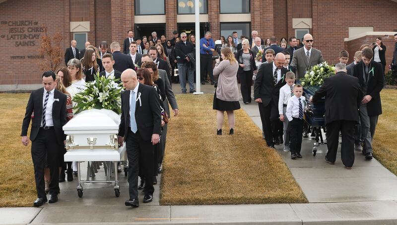 Pallbearers move the caskets of Consuelo Alejandra Haynie, and three of her children — Alexis, Matthew and Milan — following their funeral in Grantsville on Jan. 24, 2020.