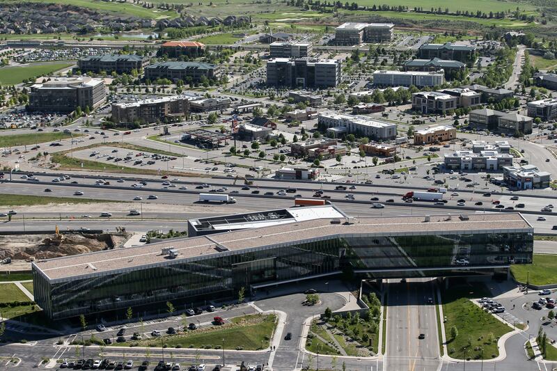 The Adobe headquarters, foreground, and other commercial developments that make up the "Silicon Slopes" around Point of the Mountain in Lehi are pictured on Wednesday, May 16, 2018.