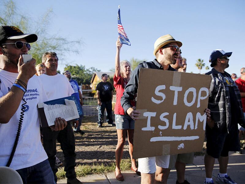 Demonstrators shout during a "Freedom of Speech Rally Round II" outside the Islamic Community Center in Phoenix, Arizona, on May 29, 2015.