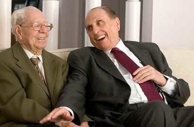 President Thomas S. Monson and Eldred G. Smith laugh as they talk as President Monson pays a visit to Smith on his 105th birthday at the Smith's home Jan. 9, 2012.