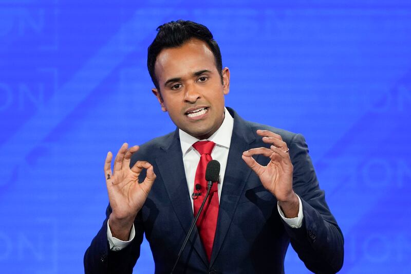 Vivek Ramaswamy gesturing during a Republican presidential primary debate.