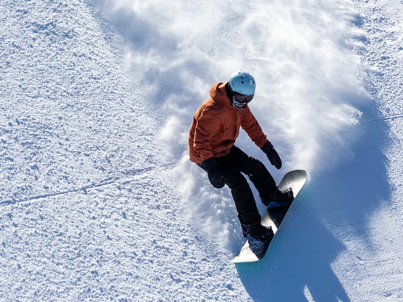 A snowboarder make their way down a run at Brighton Resort in Big Cottonwood Canyon.