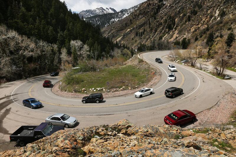 Vehicles make their way up and down Big Cottonwood Canyon on Friday, April 21, 2017.